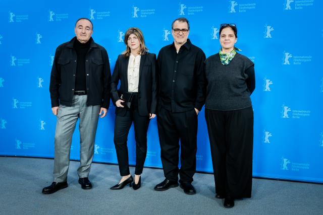 16 February 2026, Berlin: (L-R) Ukrainian director Alexander Rodnyansky, Hungarian screenwriter Kata Wwber, director Kornel Mundruczo and executive producer Viktoria Petranyi attend the photocall for the film "At the Sea" during the 76th Berlin International Film Festival. Photo: Christoph Soeder/dpa