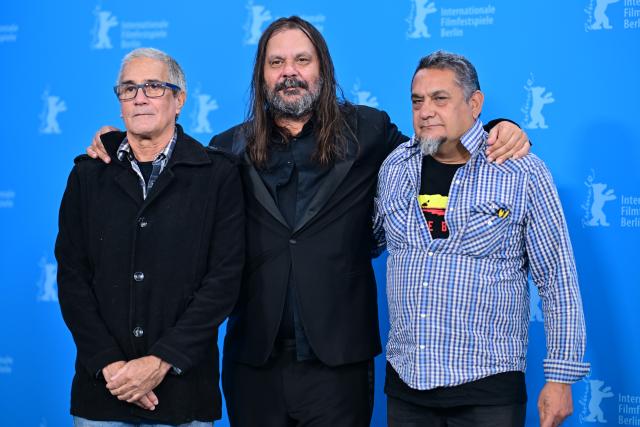 17 February 2026, Berlin: (L-R) Australian filmmaker Steven McGregor, Australian film director Warwick Thornton, and David Tranter, screenwriter and co-producer, stand together during the press conference for the film "Wolfram" at the 76th Berlin International Film Festival, taking place from February 12 to 22, 2026. Photo: Sebastian Christoph Gollnow/dpa