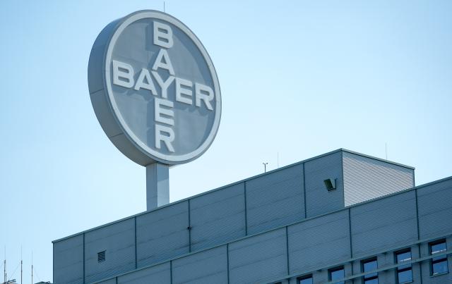 FILED - 22 August 2019, Saxony-Anhalt, Bitterfeld-Wolfen: A view of the logo at the Bayer Bitterfeld GmbH plant. Photo: Hendrik Schmidt/dpa-Zentralbild/dpa