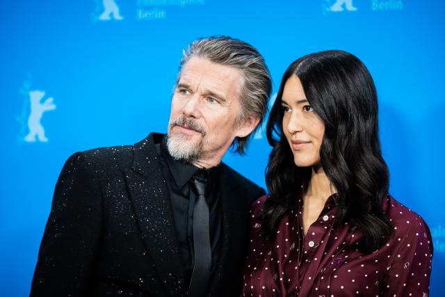 17 February 2026, Berlin: US actors Ethan Hawke (L) and Julia Jones arrive to attend the photocall for the film "The Weight" during the 76th Berlin International Film Festival. Photo: Christoph Soeder/dpa