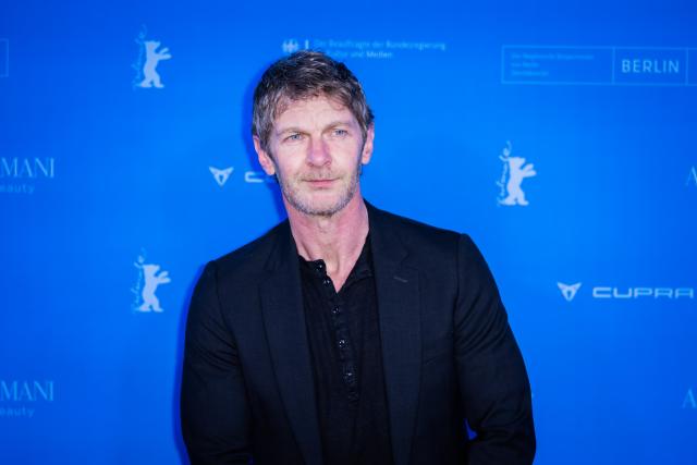 17 February 2026, Berlin: British actor Sam Hazeldine stands on the red carpet at the Zoopalast cinema for the premiere of the film "The Weight" during the premiere of the film "The Weight" during the 76th Berlin International Film Festival. Photo: Christoph Soeder/dpa