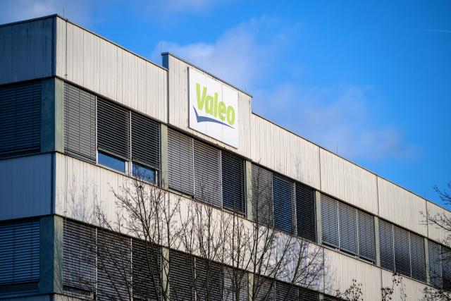 FILED - 25 January 2024, Bavaria, Ebern: The Valeo logo is seen on one of the automotive supplier's plants in Ebern. Photo: Pia Bayer/dpa