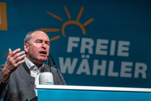18 February 2026, Bavaria, Deggendorf: Bavarian Minister of Economic Affairs and Deputy Minister President, Hubert Aiwanger (Free Voters), speaks at the political Ash Wednesday of the Free Voters in the Stadthalle. Photo: Armin Weigel/dpa