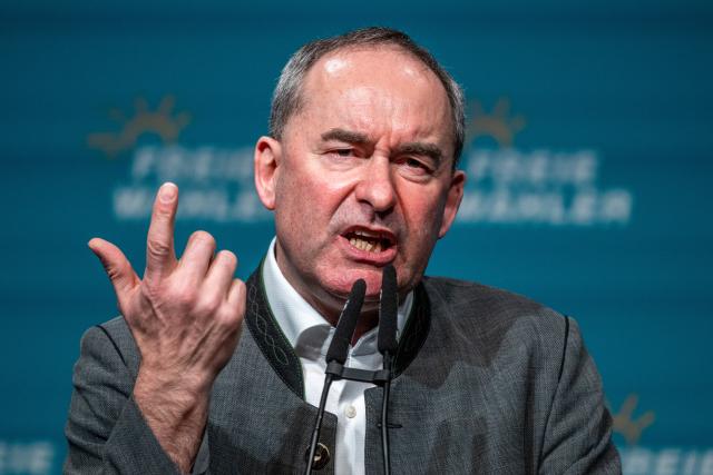 18 February 2026, Bavaria, Deggendorf: Bavarian Minister of Economic Affairs and Deputy Minister President, Hubert Aiwanger (Free Voters), speaks at the political Ash Wednesday of the Free Voters in the Stadthalle. Photo: Armin Weigel/dpa