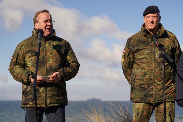 18 February 2026, Schleswig-Holstein, Putlos: Boris Pistorius (L), German Minister of Defense, speaks alongside NATO General Ingo Gerhartz, Commander Allied Joint Force Command Brunssum (JFC Brunssum), after the Nato manoeuvre Steadfast Dart at the military training area on the Baltic Sea coast. Photo: Marcus Brandt/dpa