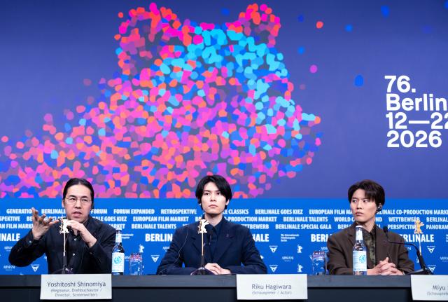 17 February 2026, Berlin: Japan's director Yoshitoshi Shinomiya (L) and actors Miyu Irino (R) and Riku Hagiwara speak during a press conference for the film "A New Dawn" during the 76th Berlin International Film Festival. Photo: Soeren Stache/dpa
