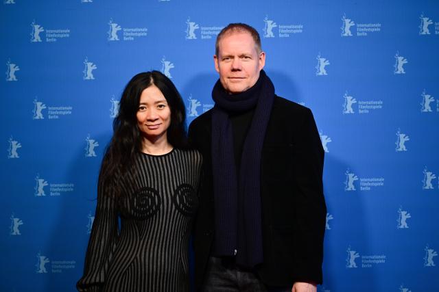 17 February 2026, Berlin: British composer Max Richter (R) and Chinese director Chloe Zhao arrive to attend the Berlinale Camera award ceremony during the 76th Berlin International Film Festival. Photo: Sebastian Christoph Gollnow/dpa