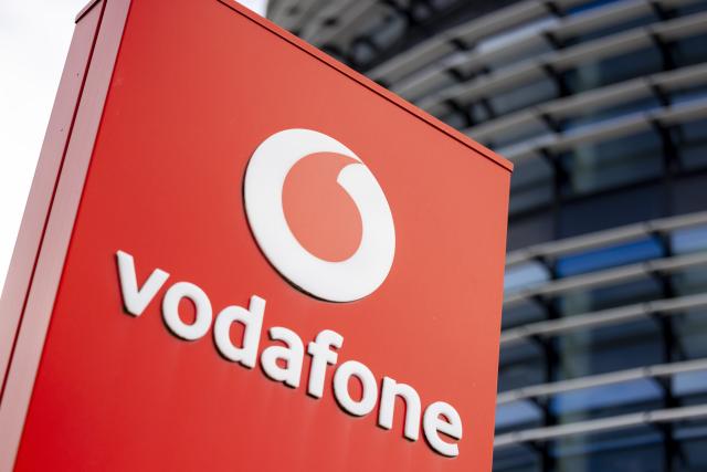 FILED - 29 May 2024, North Rhine-Westphalia, Duesseldorf: A company sign with the Vodafone logo is pictured in Duesseldorf. Photo: Thomas Banneyer/dpa