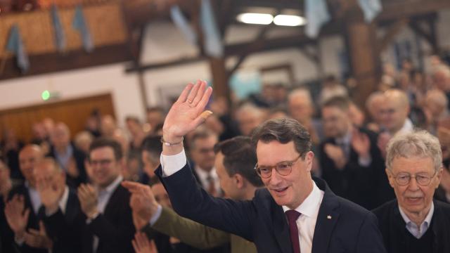 18 February 2026, North Rhine-Westphalia, Lennestadt: North Rhine-Westphalia Minister President Hendrik Wuest welcomes the guests at the Christian Democratic Union of Germany (CDU) Political Ash Wednesday event in the Schuetzenhalle Kirchveischede. Photo: Rolf Vennenbernd/dpa