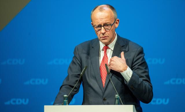 18 February 2026, Rheinland-Pfalz, Trier: Germany's Chancellor Friedrich Merz delivers a speech at the CDU Rhineland-Palatinate Ash Wednesday political gathering, hosted by the CDU district association of Trier in cooperation with the district associations of Trier-Stadt and Trier-Saarburg. Photo: Harald Tittel/dpa