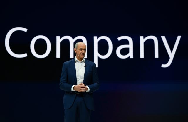 12 February 2026, Bavaria, Munich: Roland Busch, CEO of Siemens AG, stands on the stage in the Olympiahalle during the Annual Shareholders' Meeting of Siemens AG. Photo: Sven Hoppe/dpa