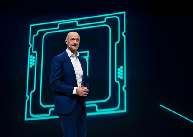 12 February 2026, Bavaria, Munich: Roland Busch, CEO of Siemens AG, stands on the stage in the Olympiahalle during the Annual Shareholders' Meeting of Siemens AG. Photo: Sven Hoppe/dpa