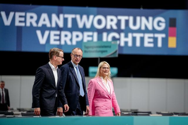 19 February 2026, Baden-Württemberg, Stuttgart: German Chancellor Friedrich Merz visits the party conference hall of the Christian Democratic Union (CDU). The CDU top committees meet to prepare for the two-day party conference. Photo: Kay Nietfeld/dpa