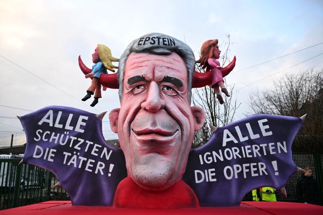 FILED - 16 February 2026, North Rhine-Westphalia, Cologne: An Epstein themed float leaves the float construction hall. Rose Monday on the Rhine is the highlight of the Rhineland carnival season with its traditional parades. Photo: Federico Gambarini/dpa