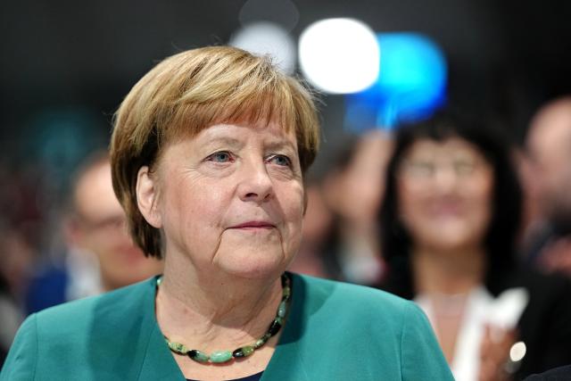 20 February 2026, Baden-Wuerttemberg, Stuttgart: Former German Chancellor Angela Merkel follows the Chancellor Friedrich Merz's speech at the Christian Democratic Union of Germany (CDU) federal party conference. Photo: Kay Nietfeld/dpa