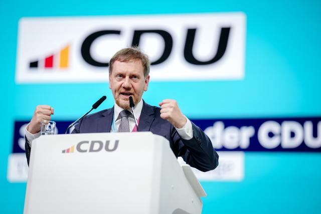 21 February 2026, Baden-Württemberg, Stuttgart: Michael Kretschmer (CDU), Minister President of Saxony, speaks at the CDU federal party conference. After the board elections, the second day of the party conference will focus on content. Among other things, motions on part-time work, restricting social media use for children and pension reform will be discussed. Photo: Kay Nietfeld/dpa