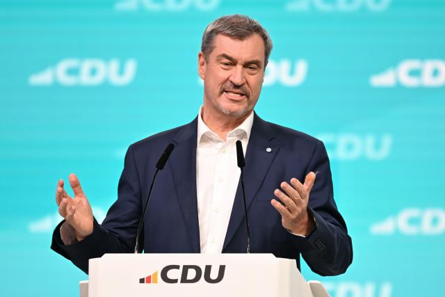 21 February 2026, Baden-Württemberg, Stuttgart: Markus Soeder (CSU), Minister President of Bavaria and CSU leader, speaks at the CDU federal party conference. After the board elections, the second day of the party conference will focus on content. Among other things, motions on part-time work, restrictions on social media use for children and pension reform will be discussed. Photo: Katharina Kausche/dpa