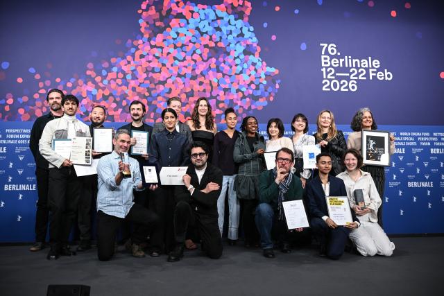 21 February 2026, Berlin: The winners celebrate at the award ceremony of the independent juries during the Berlinale. The 76th Berlin International Film Festival will take place from February 12 to 22, 2026. Photo: Britta Pedersen/dpa