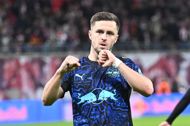 21 February 2026, Saxony, Leipzig: Leipzig's Christoph Baumgartner celebrates scoring his side's first goal during the German Bundesliga soccer match between RB Leipzig and Borussia Dortmund at Red Bull Arena. Photo: David Hammersen/dpa - WICHTIGER HINWEIS: Gemäß den Vorgaben der DFL Deutsche Fußball Liga bzw. des DFB Deutscher Fußball-Bund ist es untersagt, in dem Stadion und/oder vom Spiel angefertigte Fotoaufnahmen in Form von Sequenzbildern und/oder videoähnlichen Fotostrecken zu verwerten bzw. verwerten zu lassen.
