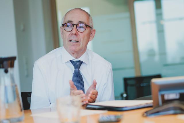 FILED - 12 December 2025, Berlin: Peter Adrian, President of the German Chamber of Industry and Commerce (DIHK), speaks during an interview with the German Press Agency (DPA). Photo: Carsten Koall/dpa