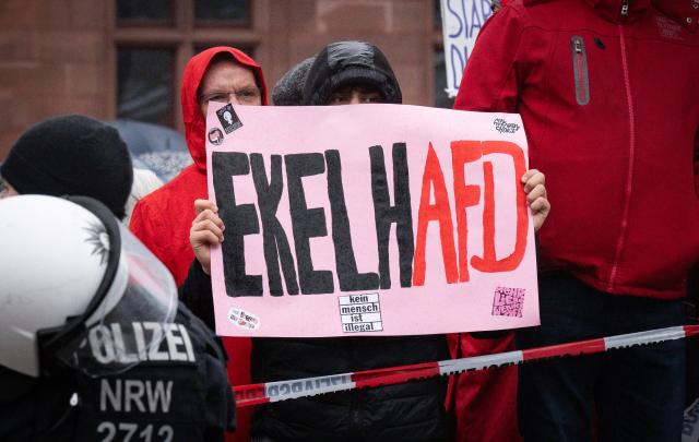 22 February 2026, North Rhine-Westphalia, Dortmund: A broad coalition protests an Alternative for Germany (AfD) meeting at City Hall. Alongside Dortmund parties such as the SPD, Greens, and Left Party, trade unions, the student council, Fridays for Future, and Grandmothers Against the Right joined the rally. The AfD faction plans a New Year's reception in the Buergerhalle this evening with up to 280 guests. Photo: Benjamin Westhoff/dpa