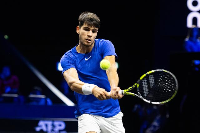 22 September 2024, Berlin: Spanish tennis player Carlos Alcaraz of Team Europe in action against US' Taylor Fritz of Team World during their singles match of the Laver Cup tennis tournament at Uber Arena. Photo: Christophe Gateau/dpa