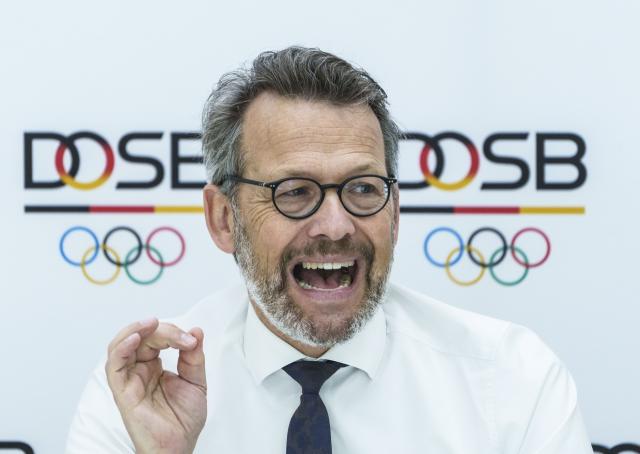 FILED - 11 September 2025, Hesse, Frankfurt/Main: Otto Fricke, Chairman of the German Olympic Sports Confederation (DOSB), sits down for a press conference. Photo: Andreas Arnold/dpa