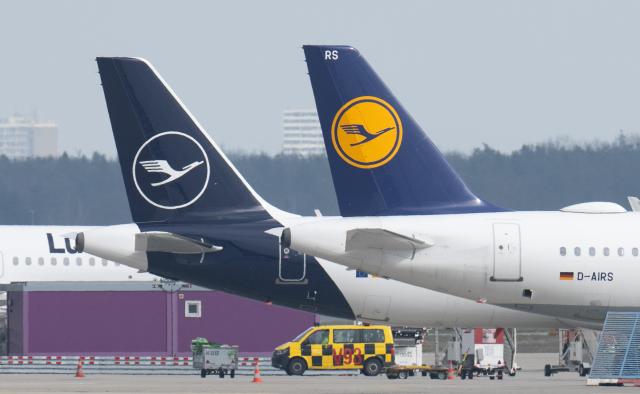 FILED - 12 March 2024, Hesse, Frankfurt/Main: German airline Lufthansa passenger planes stand on the tarmac at Frankfurt Airport. Photo: Boris Roessler/dpa