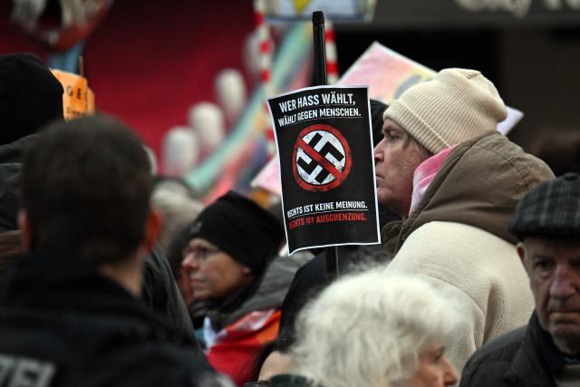 23 February 2026, North Rhine-Westphalia, Duesseldorf: Protesters rally against Bjoern Hoecke, with thousands expected to attend a demonstration in North Rhine-Westphalia opposing the Thuringian AfD leader's appearance. Photo: Federico Gambarini/dpa