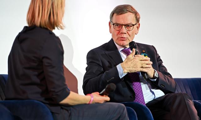 23 February 2026, Berlin: German Foreign Minister Johann Wadephul (R) speaks with a moderator at a panel discussion at "Cafe Kyiv", an event organized by the Konrad Adenauer Foundation and attended by political, academic and cultural figures. Photo: Markus Lenhardt/dpa