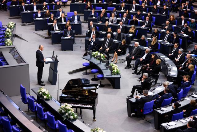 24 February 2026, Berlin: German Chancellor Friedrich Merz speaks at the funeral service for the late former German Minister for Family Affairs and long-time Bundestag President Rita Suessmuth (CDU) at the German Bundestag. Photo: Bernd von Jutrczenka/dpa