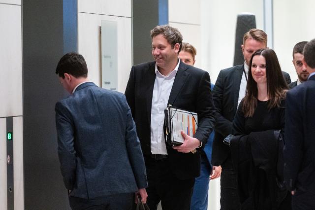 24 February 2026, Berlin: German Minister of Finance Lars Klingbeil (C) leaves after a meeting of the Social Democratic Party of Germany (SPD) parliamentary group in the Bundestag. Photo: Christophe Gateau/dpa