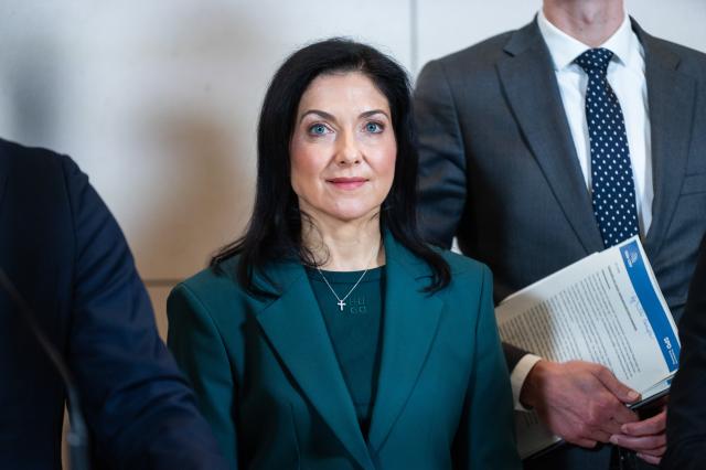 24 February 2026, Berlin: Katherina Reiche, Germany's Minister for Economic Affairs and Energy, stands during a press statement on the Building Energy Act in the Bundestag. Photo: Christophe Gateau/dpa