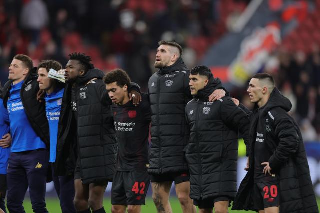 24 February 2026, North Rhine-Westphalia, Leverkusen: Leverkusen players thank the fans after the UEFA Champions League knockout phase play offs, second leg soccer match between Bayer Leverkusen and Olympiacos Piraeus at BayArena. Photo: Rolf Vennenbernd/dpa