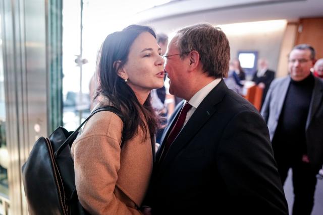 25 February 2026, Berlin: Annalena Baerbock, President of the United Nations General Assembly, is greeted by Committee Chairman Armin Laschet before the meeting of the Bundestag Committee on Foreign Affairs. Photo: Kay Nietfeld/dpa