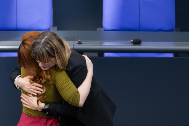 27 February 2026, Berlin: Kathrin Gebel, member of the German Bundestag, is embraced by Clara Buenger of The Left Party, also a member of the Bundestag, after her speech during the 60th session of the Bundestag on combating sexual abuse. Photo: Sebastian Christoph Gollnow/dpa