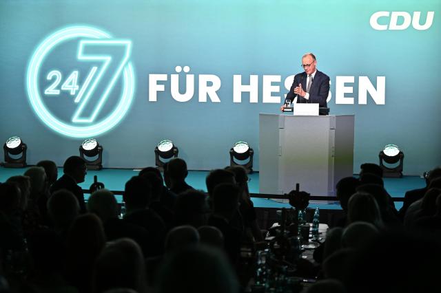 27 February 2026, Hesse, Volkmarsen: Germany's Chancellor Friedrich Merz speaks at an election campaign event in the Nordhessenhalle, marking the start of the CDU federal chairman's final push in the local election campaign ahead of the March 15, 2026, vote in Hesse. Photo: Swen Pförtner/dpa