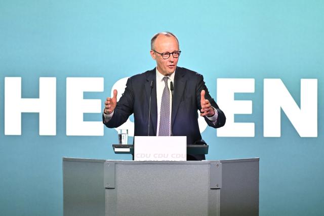 27 February 2026, Hesse, Volkmarsen: Germany's Chancellor Friedrich Merz speaks at an election campaign event in the Nordhessenhalle, marking the start of the CDU federal chairman's final push in the local election campaign ahead of the March 15, 2026, vote in Hesse. Photo: Swen Pförtner/dpa