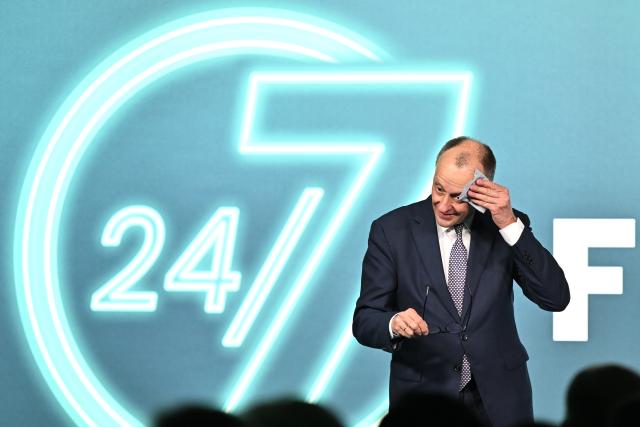 27 February 2026, Hesse, Volkmarsen: Germany's Chancellor Friedrich Merz speaks at an election campaign event in the Nordhessenhalle, marking the start of the CDU federal chairman's final push in the local election campaign ahead of the March 15, 2026, vote in Hesse. Photo: Swen Pförtner/dpa