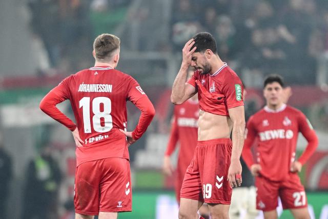 27 February 2026, Bavaria, Augsburg: (L-R) Cologne's Isak Johannesson, Cenk Oezkacar, and Felipe Chavez react after the German Bundesliga soccer match between FC Augsburg and 1. FC Cologne at the WWK Arena. Photo: Harry Langer/dpa - WICHTIGER HINWEIS: Gemäß den Vorgaben der DFL Deutsche Fußball Liga bzw. des DFB Deutscher Fußball-Bund ist es untersagt, in dem Stadion und/oder vom Spiel angefertigte Fotoaufnahmen in Form von Sequenzbildern und/oder videoähnlichen Fotostrecken zu verwerten bzw. verwerten zu lassen.
