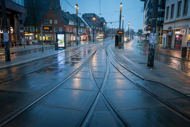 28 February 2026, Bremen: A View of a deserted stop of Bremer Strassenbahn AG (BSAG) at the Domsheide PNV junction at dawn on the second day of a two-day warning strike in local transport. The Verdi trade union has called on its members to go on strike on Friday and Saturday. Photo: Focke Strangmann/dpa