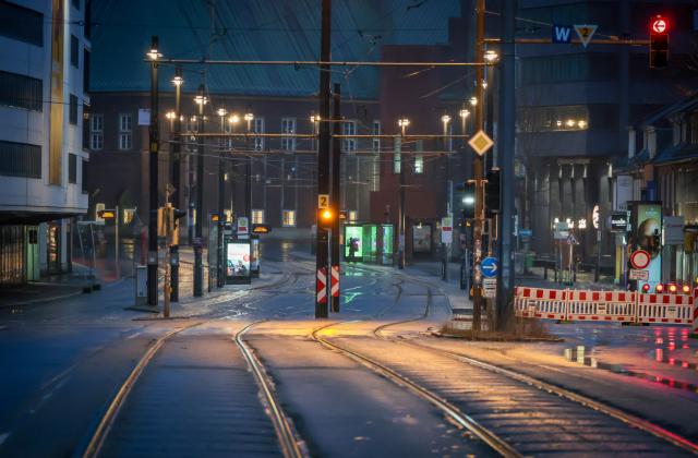 28 February 2026, Bremen: A View of a deserted stop of Bremer Strassenbahn AG (BSAG) at the Domsheide PNV junction at dawn on the second day of a two-day warning strike in local transport. The Verdi trade union has called on its members to go on strike on Friday and Saturday. Photo: Focke Strangmann/dpa