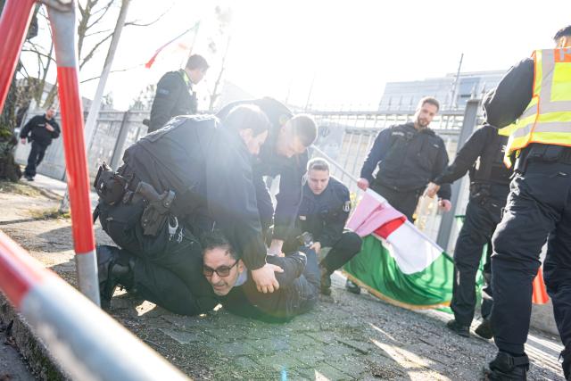 28 February 2026, Berlin: A man is arrested by police on the fringes of a demonstration of the National Council of Resistance of Iran, in front of the Iranian embassy in Berlin. Photo: Fabian Sommer/dpa