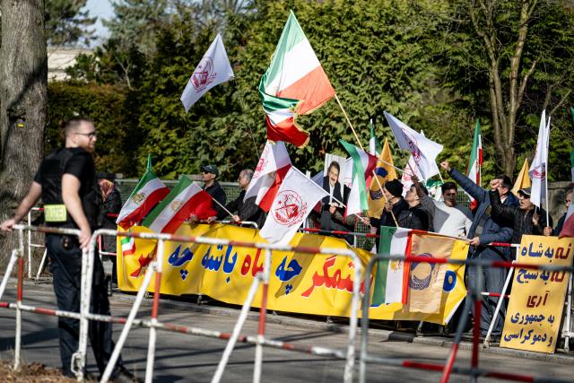 28 February 2026, Berlin: People take part in a demonstration of the National Council of Resistance of Iran, in front of the Iranian embassy in Berlin. Photo: Fabian Sommer/dpa