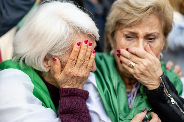 28 February 2026, Berlin: People take part in a demonstration organized by the National Council of Resistance of Iran at Potsdamer Platz. Photo: Fabian Sommer/dpa