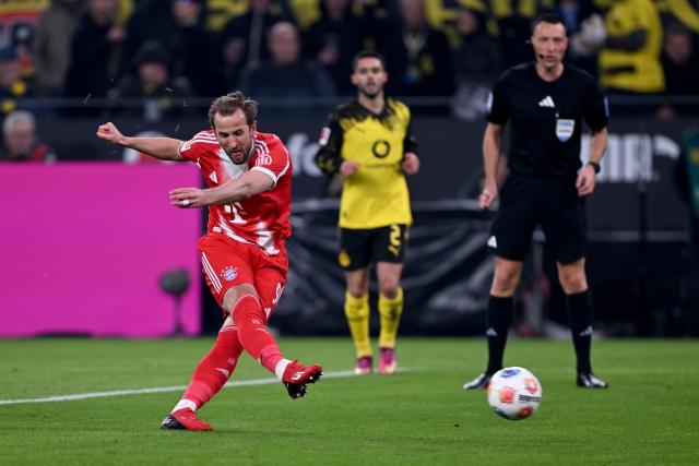 28 February 2026, North Rhine-Westphalia, Dortmund: Bayern Munich's Harry Kane attempts to score a goal during the German Bundesliga soccer match between Borussia Dortmund and FC Bayern Munich at Signal Iduna Park. Photo: David Inderlied/dpa - IMPORTANT NOTICE: DFL and DFB regulations prohibit any use of photographs as image sequences and/or quasi-video.