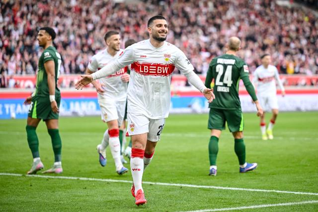 01 March 2026, Baden-Wuerttemberg, Stuttgart: Stuttgart's Deniz Undav celebrates scoring his side's first goal during the German Bundesliga soccer match between VfB Stuttgart and VfL Wolfsburg at MHPArena. Photo: Harry Langer/dpa - WICHTIGER HINWEIS: Gemäß den Vorgaben der DFL Deutsche Fußball Liga bzw. des DFB Deutscher Fußball-Bund ist es untersagt, in dem Stadion und/oder vom Spiel angefertigte Fotoaufnahmen in Form von Sequenzbildern und/oder videoähnlichen Fotostrecken zu verwerten bzw. verwerten zu lassen.