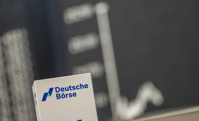 02 March 2026, Hesse, Frankfurt/Main: The German share index (DAX) can be seen on a large display in the trading room at the stock exchange. The attacks in the Middle East are causing shifts on the financial market. Photo: Andreas Arnold/dpa