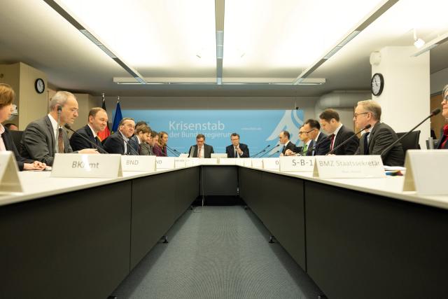 02 March 2026, Berlin: German Foreign Minister Johann Wadephul (C-L) and Boris Pistorius (4-L), German Minister of Defense, arrive at the meeting of the Federal Government's crisis team at the Federal Foreign Office. Photo: Axel Schmidt/Reuters Pool/dpa