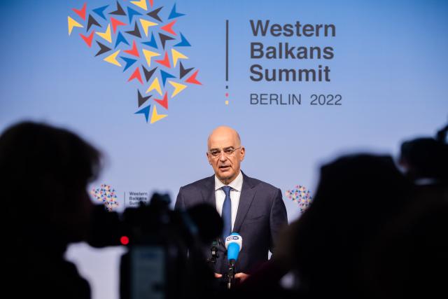 FILED - 21 October 2022, Berlin: Then Greece's Minister of Foreign Affairs Nikos Dendias delivers a statement at the conference on the Western Balkans at the Federal Foreign Office. Photo: Christoph Soeder/dpa